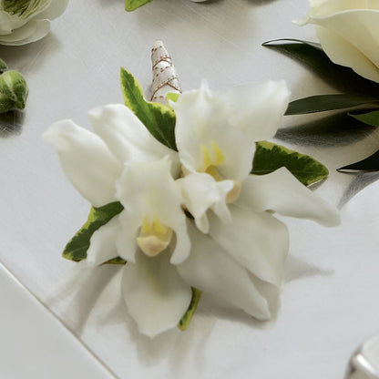 White Mini Cymbidium Boutonniere – SHARAR'S FLORIST, La Habra CA